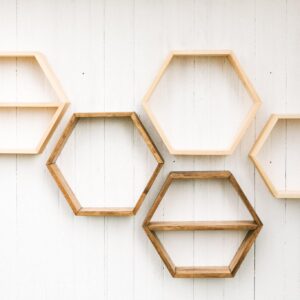 various hanging wooden hexagon shelves