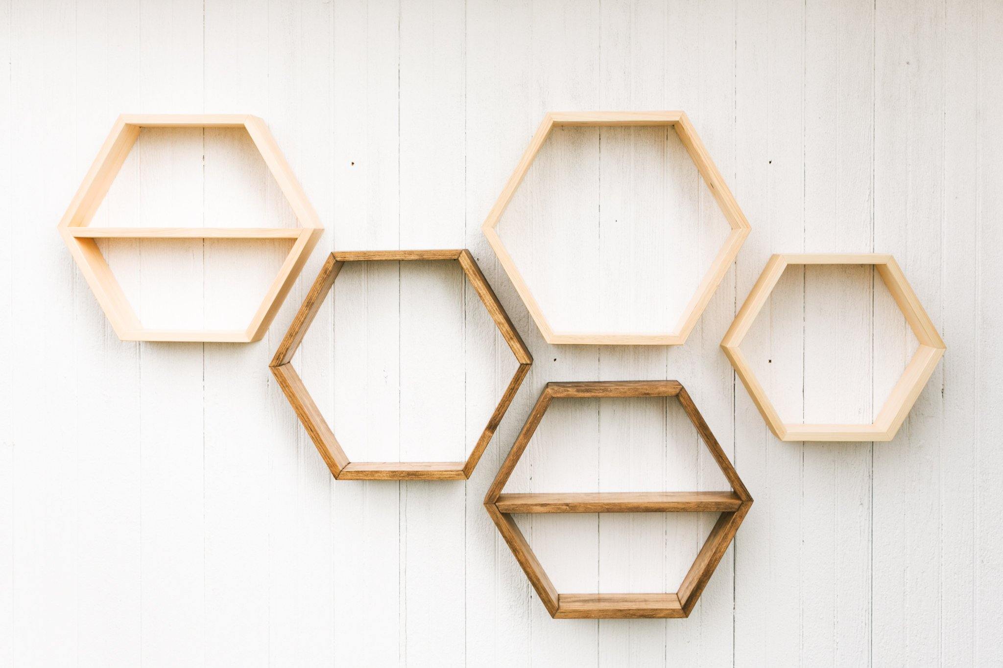 various hanging wooden hexagon shelves