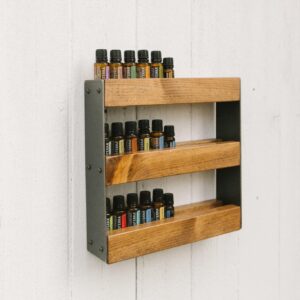 Essential Oil Wall Display with 3 essential oil racks holding various essential oils