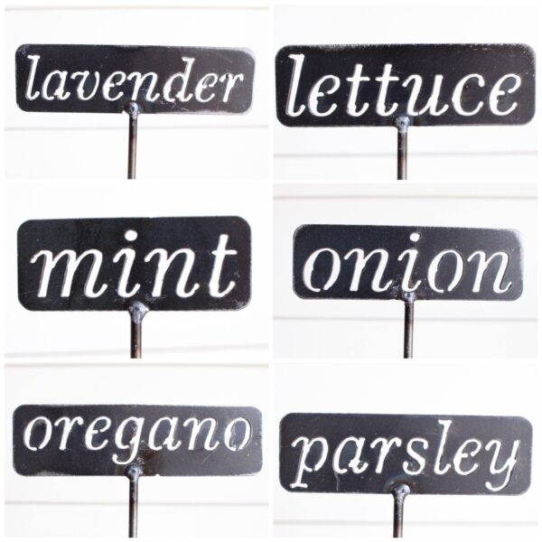 6 different metal garden stakes that read: lavender, lettuce, mint, onion, oregano, and parsley
