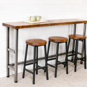 Industrial Wooden Sofa Table against a wall with 3 bar stools