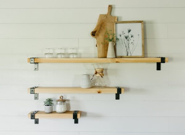 3 different sizes of wooden industrial shelves