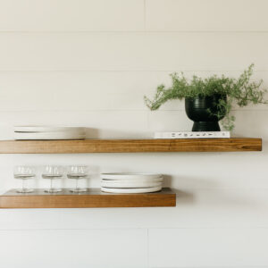 Deep Floating Wooden Shelves - holding planter and dishware